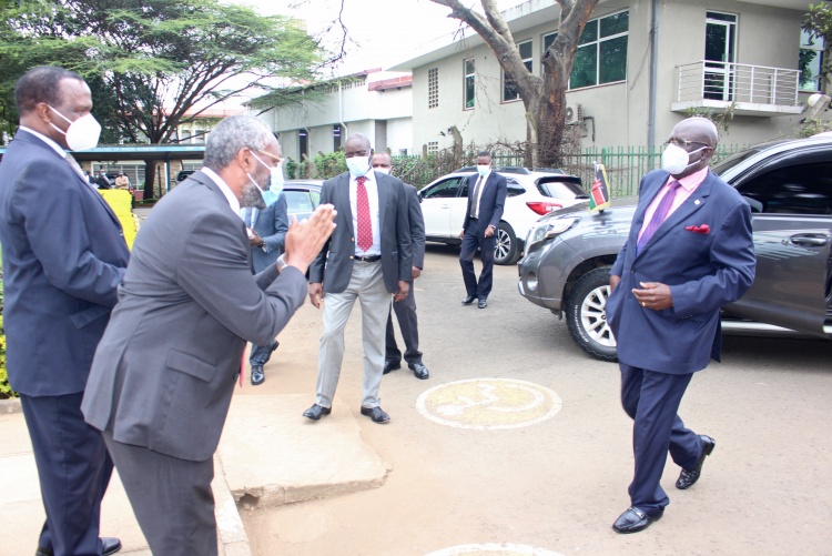 The University of Nairobi Vice Chancellor Prof. Stephen Kiama (L) welcomes Education Cabinet Secretary Prof. George Magoha at the College of Health Sciences ahead of the official launch of Center for Epidemiological Modelling and Analysis (CEMA).