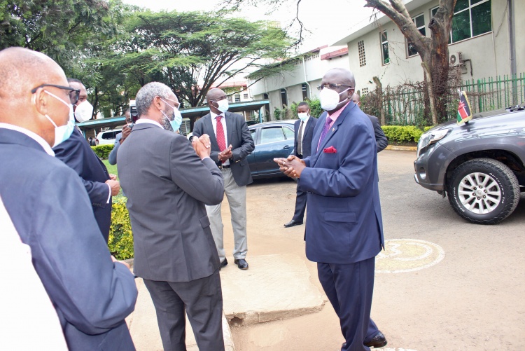 The University of Nairobi Vice Chancellor Prof. Stephen Kiama (L) welcomes Education Cabinet Secretary Prof. George Magoha at the College of Health Sciences ahead of the official launch of Center for Epidemiological Modelling and Analysis (CEMA).