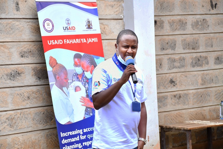 Dr Robert Kariuki medical officer in charge Ruaraka Sub-county presenting his speech 