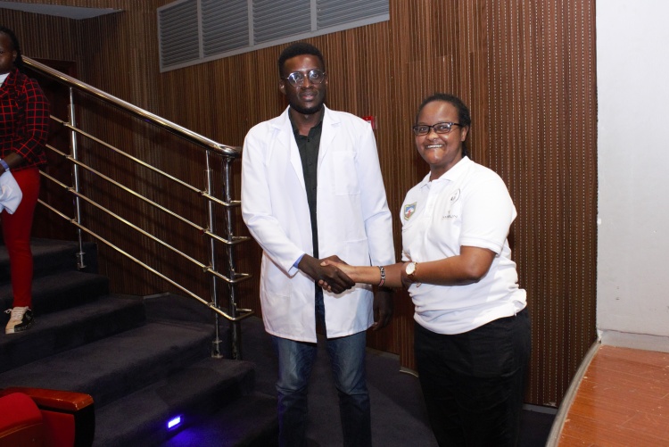 Doctors cloaking the new students 