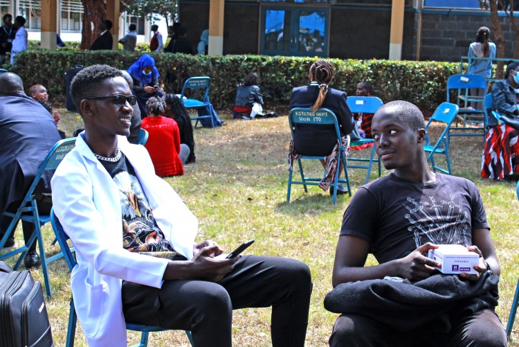 Parents and students waiting for admission