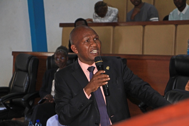 Mr. Johnson Ireri, Dean of Students & Career Services University of Nairobi, addressing students at the Faculty of Health Sciences Mental Health & Wellness Open Day