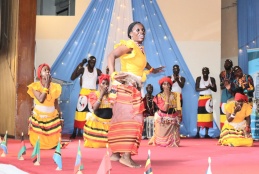 International students from Uganda performing a traditional dance.
